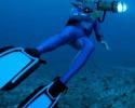Expedition dive team member Matt Ferraro swims backwards while lighting up the scene for cinematographer Yves Lefevre. © Tom Ordway, Ocean Futures Society Underwater Filming